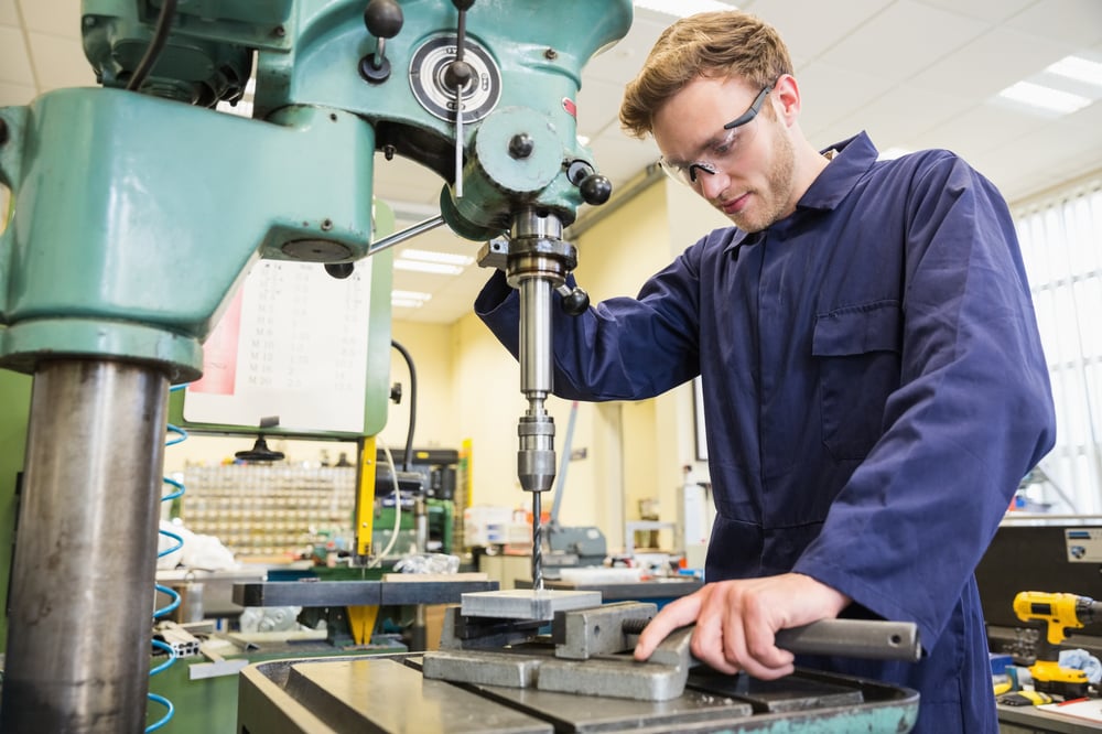 engineering-student-using-large-drill