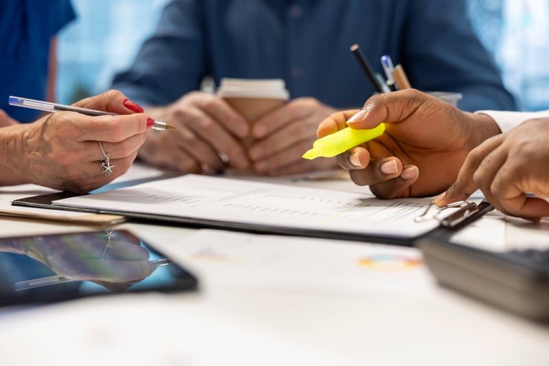financial-advisor-expert-highlighting-terms-retirement-plan-contract