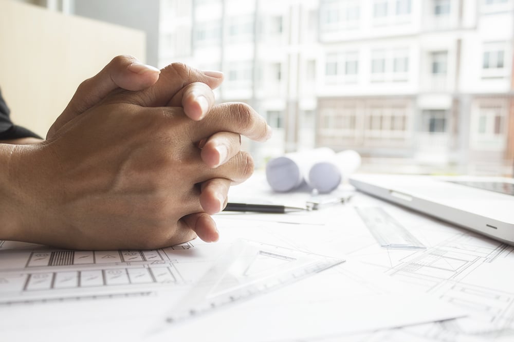 hands-engineer-working-blueprint-construction-concept-engineering-tools-vintage-tone-retro-filter-effect-soft-focus-selective-focus