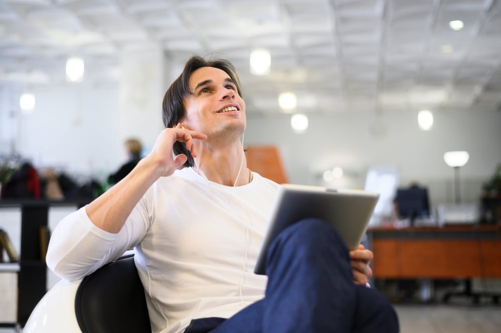 low-angle-man-with-tablet