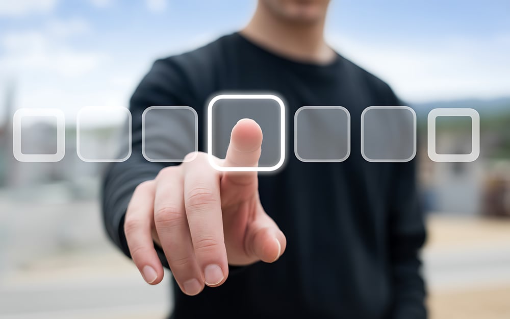 man39s-hand-pressing-glowing-button-touch-screen-with-blurred-background-outdoor-scene