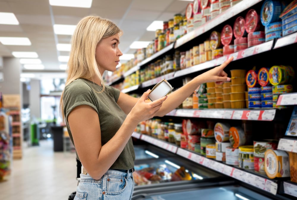 medium-shot-woman-reading-label