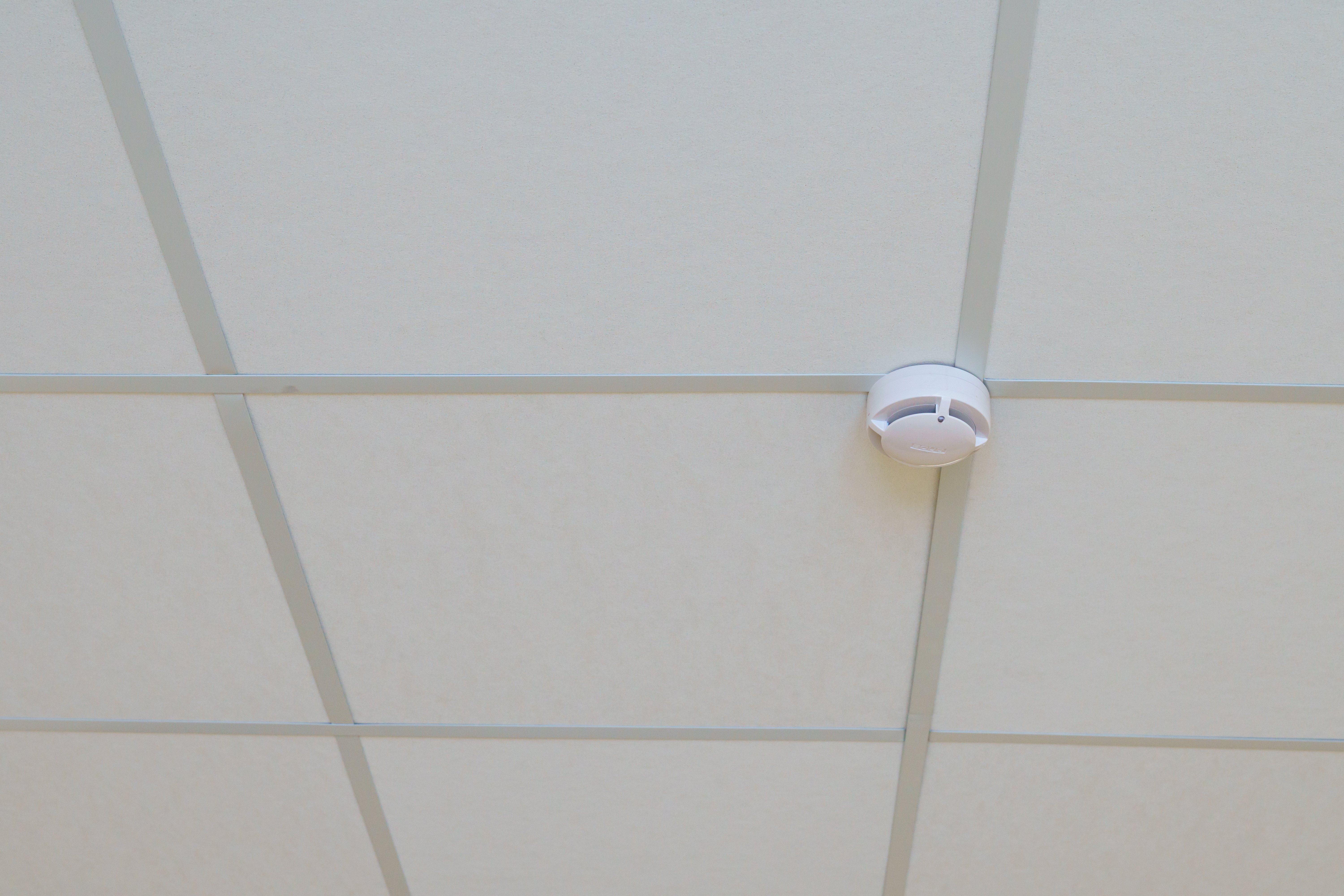 parts-ceiling-decor-corner-suspended-ceiling-made-of-white-gypsum-panels-modern-office-design