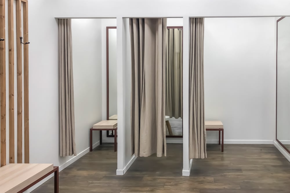 row-dressing-booths-trying-clothes