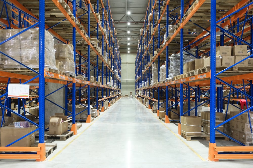 warehouse-interior-with-cardboard-boxes-shelves-close-up