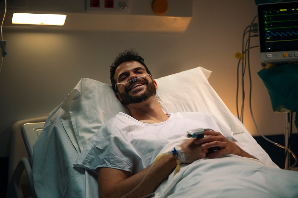 young-man-being-ill-hospital-bed