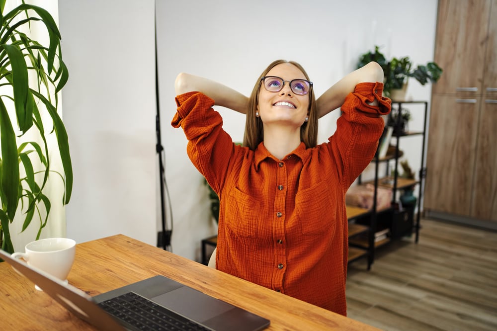 young-woman-relaxing-after-work-home-office